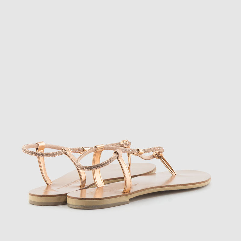 Sandalia esclava plana en piel con strass rosa